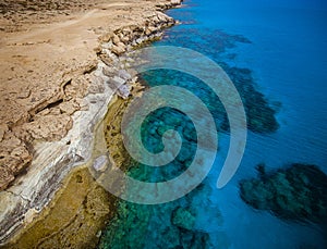 Blue lagoon in the sea near rocks