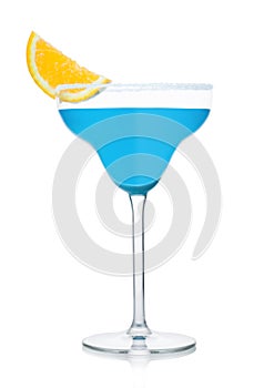 Blue lagoon summer cocktail in margarita glass with orange slice on white