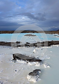 Blue Lagoon, volcanic landscape with mineral deposit.