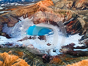 Blue lake in the crater of Gorely volcano in Kamchatka, Russia photo