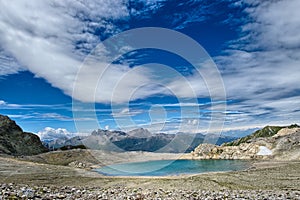Blue lake of high mountains in the summer photo