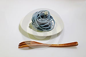 Blue LAN cable on the white dish