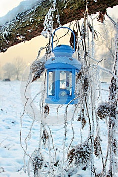 Blue lantern in winter scenery