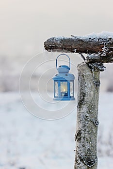 Blue lantern in winter scenery