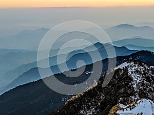 Blue Layered Mountains in the Fog