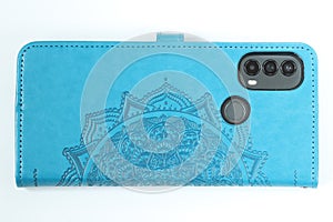 Blue leather case for smartphone.