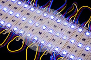 Blue led modules on black background