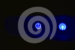 Blue LEDs of the Wi Fi router in the dark