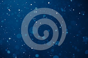 Blue light background with snowflakes particles