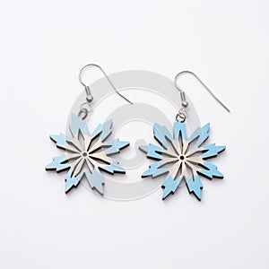 Blue And Light Blue Wood Snowflake Earrings On White Background