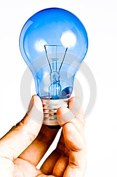 Blue light bulb in hand, Isolated