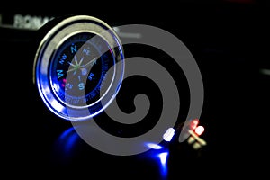 Blue light failing on Silver compass.