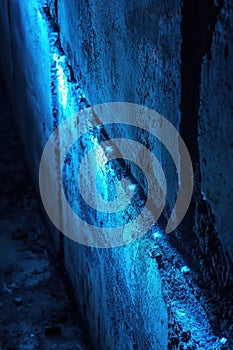 Blue Light Shining On Concrete Wall