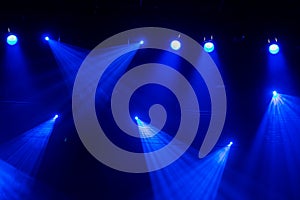 Blue light. Lighting equipment, spotlights on the stage during the show or performance