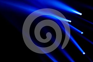 Blue light rays spotlight show concert and night club concept. Abstract light line for background and backdrop