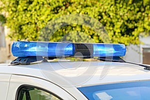 Blue lights on top of police car