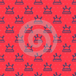 Blue line Needle bed and needles icon isolated seamless pattern on red background. Handmade and sewing theme. Vector
