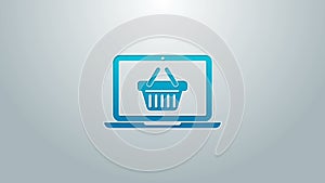 Blue line Shopping basket on screen laptop icon isolated on grey background. Concept e-commerce, e-business, online