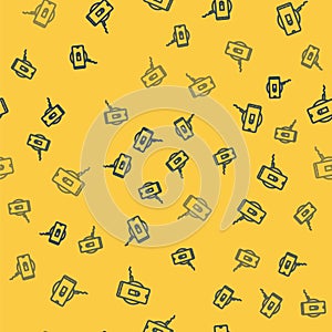 Blue line Smartphone charging on wireless charger icon isolated seamless pattern on yellow background. Charging battery
