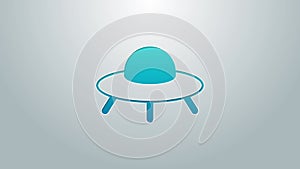 Blue line UFO flying spaceship icon isolated on grey background. Flying saucer. Alien space ship. Futuristic unknown
