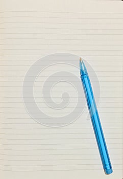 Blue lined paper with blue pen