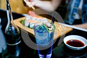 Blue Liquid and Sushi Plate