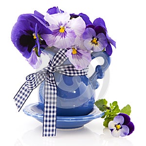 Blue little vase pansies photo