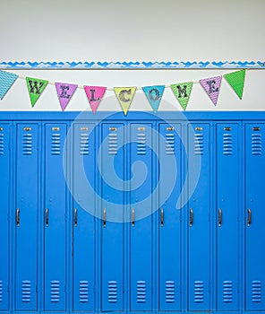 Blue lockers and colorful banner with the word welcome