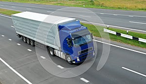 Blue lorry with grey trailer (upper view)