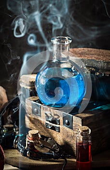 Blue magic potion with smoke
