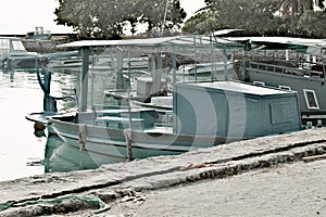 Blue maldivian boats in the harbor Ari Atoll, Maldives