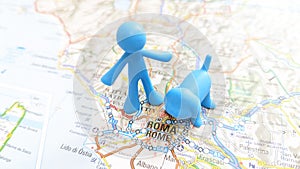 A blue man and dog plastic figure standing on Rome on a map of Italy