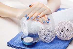 Blue manicure with dekor. spa photo