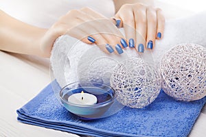 Blue manicure with dekor. spa photo