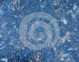 Blue marble, polished surface and texture of natural stone close-up