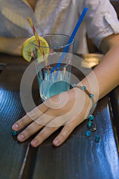 Blue marbles handmade bracelet and a cocktail