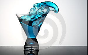 Blue Martini Glass Splashing