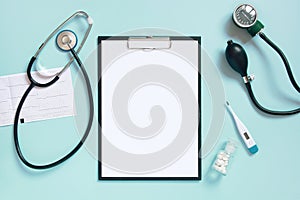 Blue medical background with clipboard and stethoscope