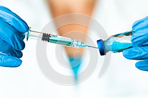 A Blue Medical Fluid Sucked into the Injection