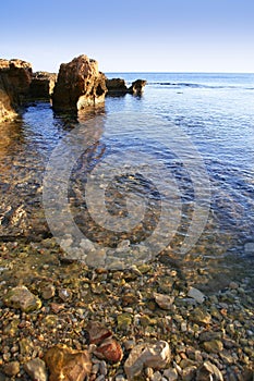 Blue Mediterranean seascape and rocks in Las Rotas photo