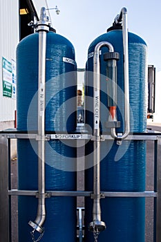 Blue metal wine fermentation tanks from a winery