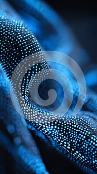 Blue microcapsule beads on textured fabric macro