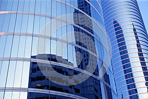 Blue mirror glass facade skyscraper buildings