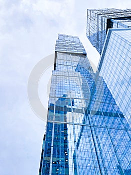 Blue mirror glass facade skyscrapers