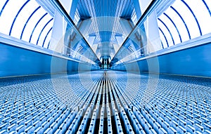 Blue modern escalator