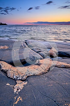 Blue moment in the rocky seashore