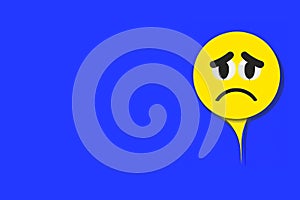 Blue Monday. Blue Monday design, the saddest day of the year. Blue color background. Yellow emoji with a sad face.