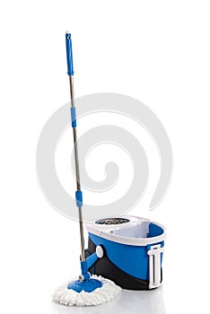 Blue mop and blue bucket isolated