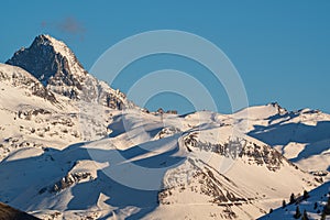 Blue morning sky over the French Alps mountains, Alpe d\'Huez, France