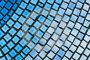 Blue mosaic gradient tiles texture background. Marine pattern design